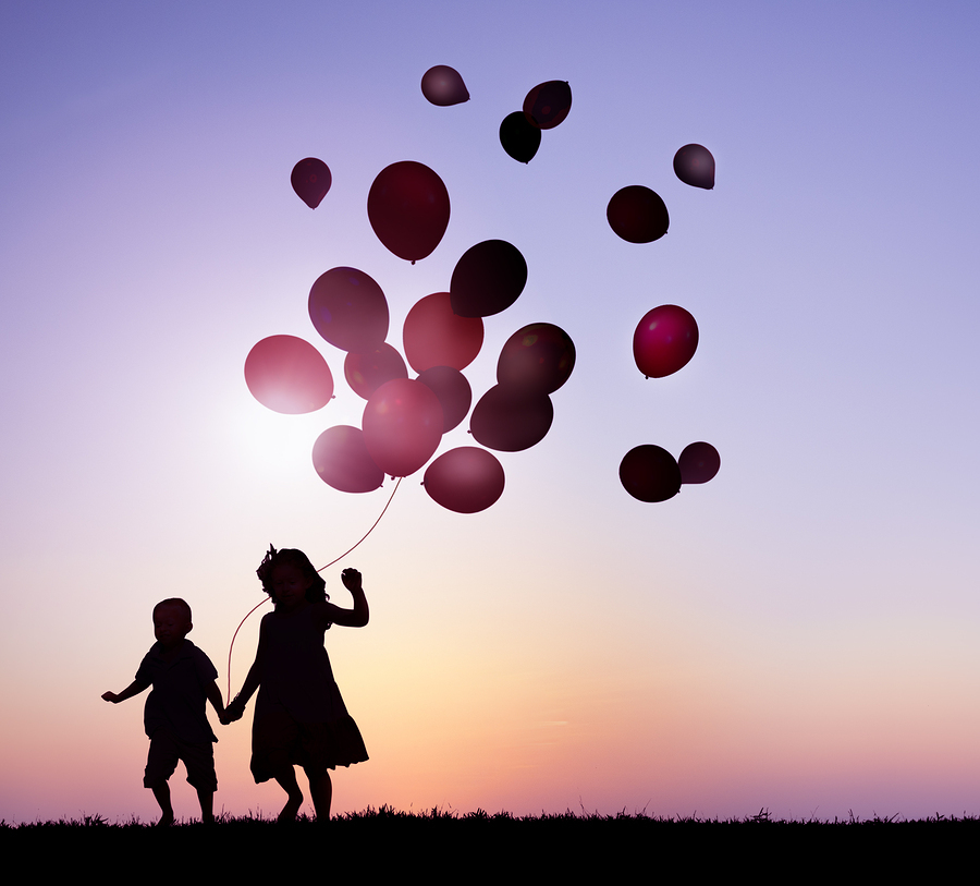 bigstock-Children-Running-With-Balloons-62478371